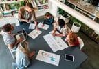 People discussing financials in a meeting