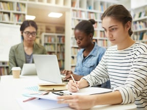Students working in a library